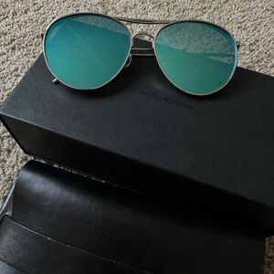 GENTLE MONSTER Silver Frame Sunglasses with Teal Blue Lenses
